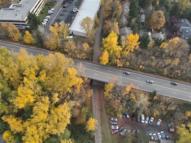 November 2024 aerial image of NE 85th Street showing the bridge over the CKC